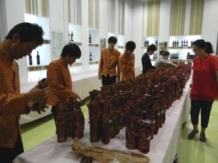 Preparing the bottles for blind tasting